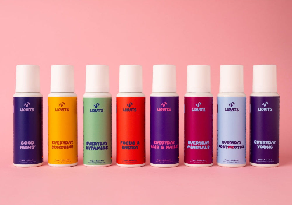 LiqVits 2nd Row Banner mit allen LiqVits aufgereiht auf Rosa Hintergrund